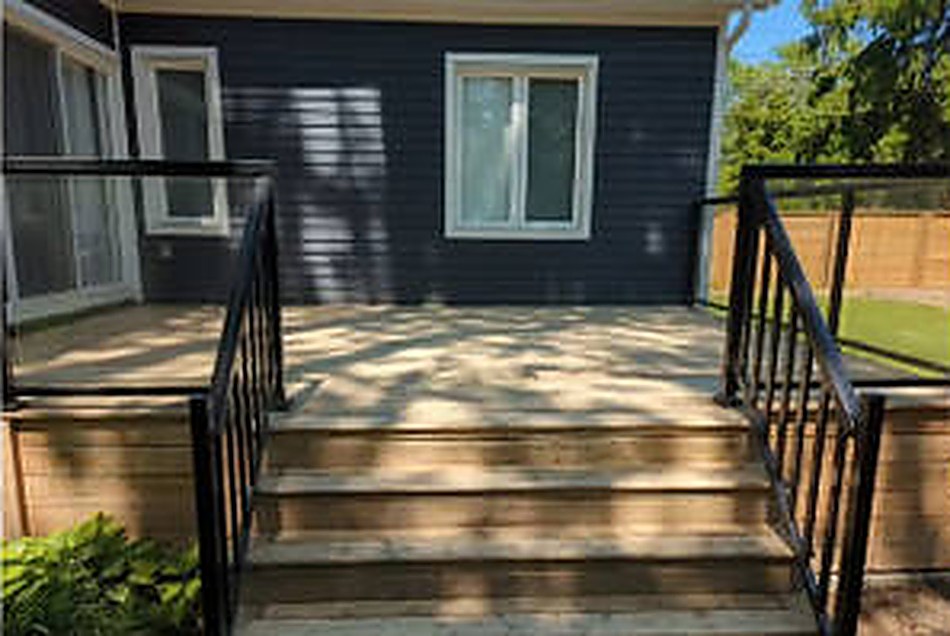 Deck and stair refinishing project by Acclivity Contracting Group